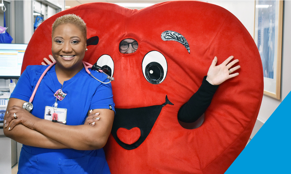 Aiken Regional team members and heart mascot